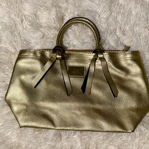 Gold Victoria’s Secret handbag bag